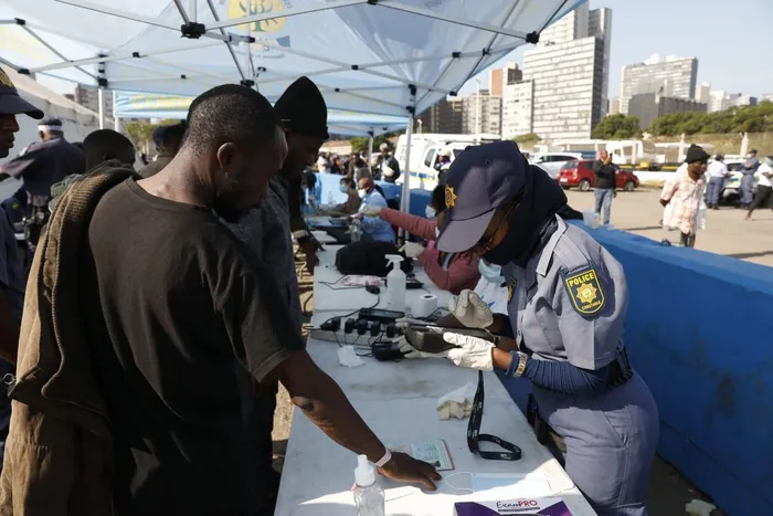 SAPS officials conduct verifications to ensure the safety and legality of the repatriation process.