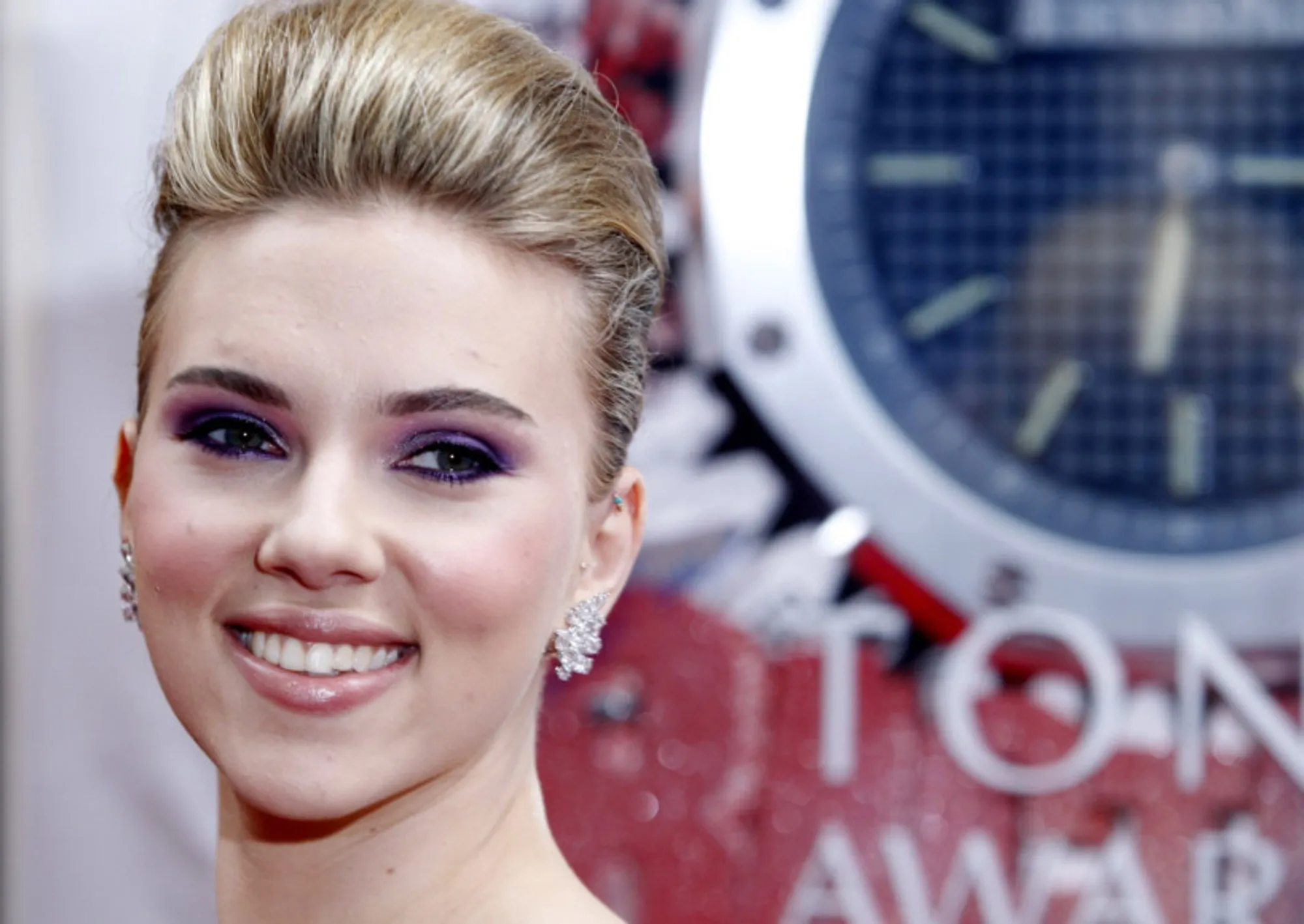Why should Scarlett be red-faced?