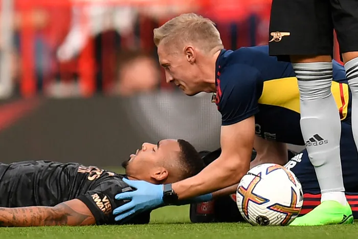 Arsenal's Brazilian striker Gabriel Jesus is treated for a head injury during the English Premier League match. Photo: Oli Scarff/AFP