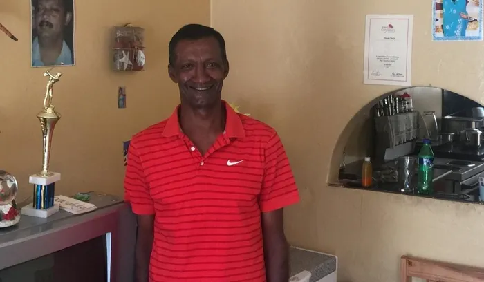 Poongavanam “Vassie” Chetty with his golf trophy. 
