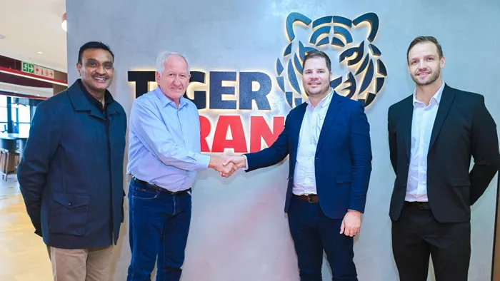 Tiger Brands CEO, Tjaart Kruger with Apollo Africa CEO, Nico de Bruyn, with Praveen Balgobind, Chief Manufacturing Officer, Tiger Brands (far left) and Trevor Gore, Business Development Manager, Apollo Africa (far right).