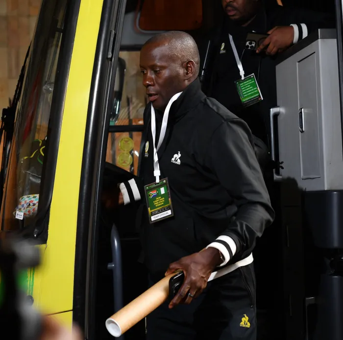 Bafana Bafana assistant coach Helman Mkhalele did not leave with the team to Mexico due to visa issues.
