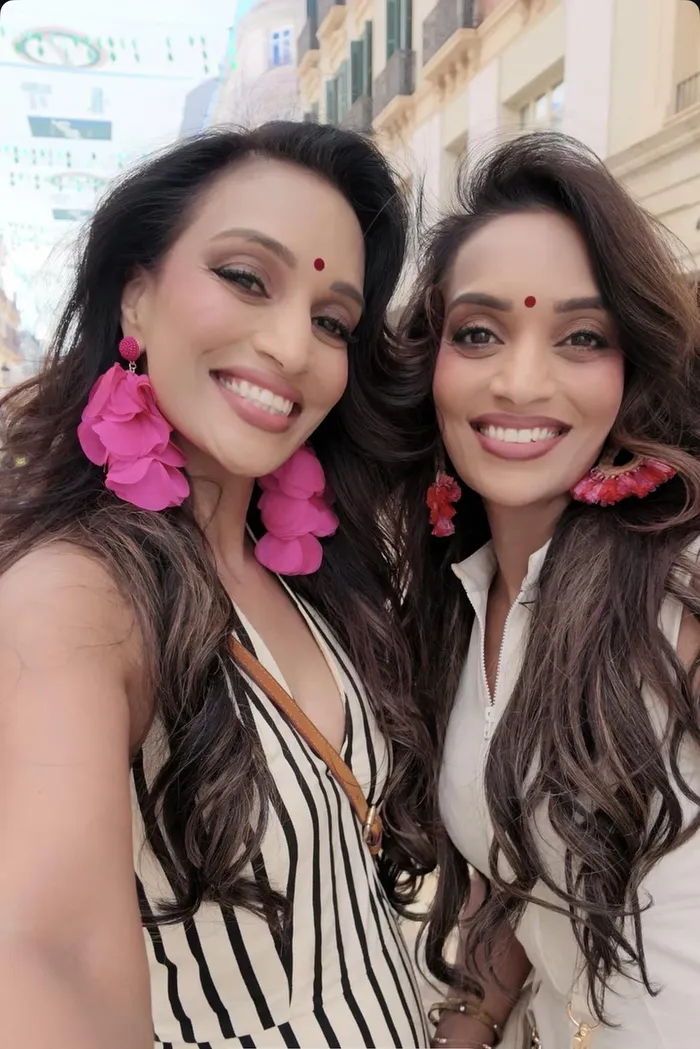 Losh and Resh Naidoo enjoy a sistercation in Spain. 