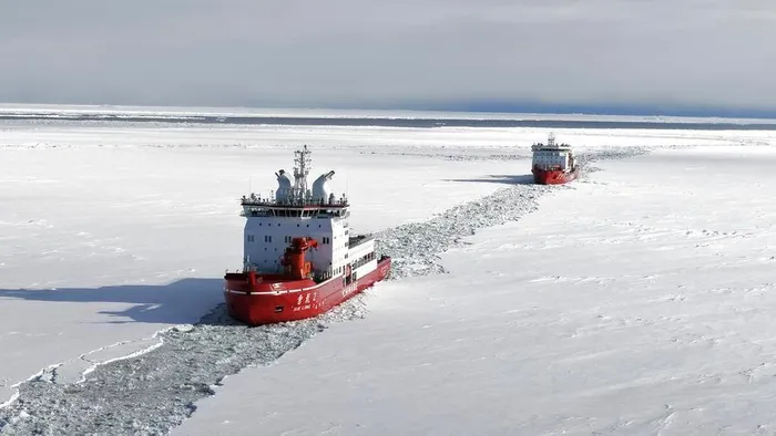 A drone photo taken on Dec. 5, 2025 shows research icebreakers Xuelong and Xuelong 2 