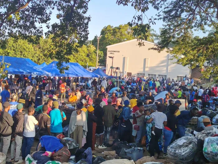 More than 20 buses arrive at Sherwood Hall as Malawian repatriation gains momentum.