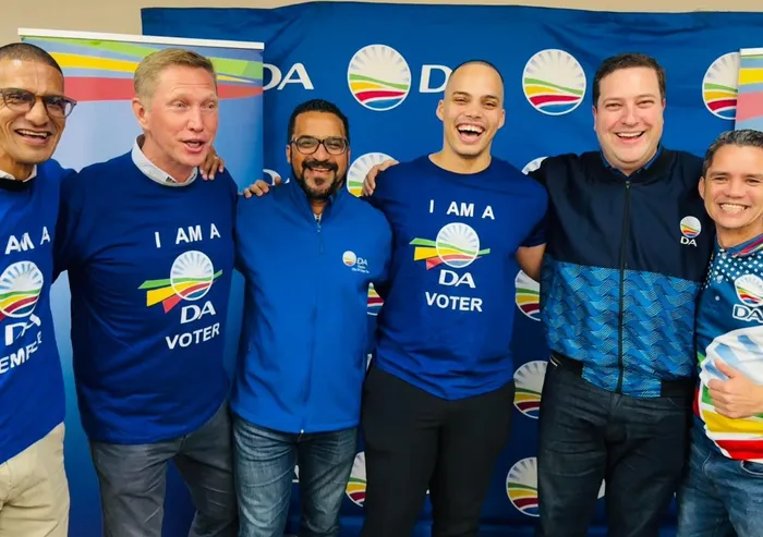 Democratic Alliance leader Mayor Geordin Hill-Lewis (fourth left) welcomed Liam Jacobs back to the party. 
