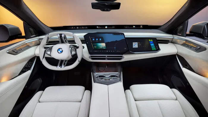 BMW’s new cabin design pairs minimalist surfaces with advanced driver-focused technology.