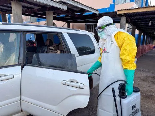 A Doctors Without Borders (MSF) staff member photographed last week in full personal protective equipment sanitising a vehicle used to transport suspected Ebola patients at the Elikya Treatment Center (ETC) in Bunia, Ituri province, DR Congo, following strict infection prevention and control protocols.