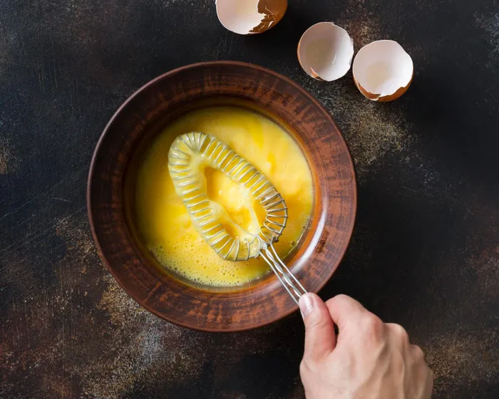 Fresh egg yolks create a silky, velvety texture that powdered mixes simply can't replicate.