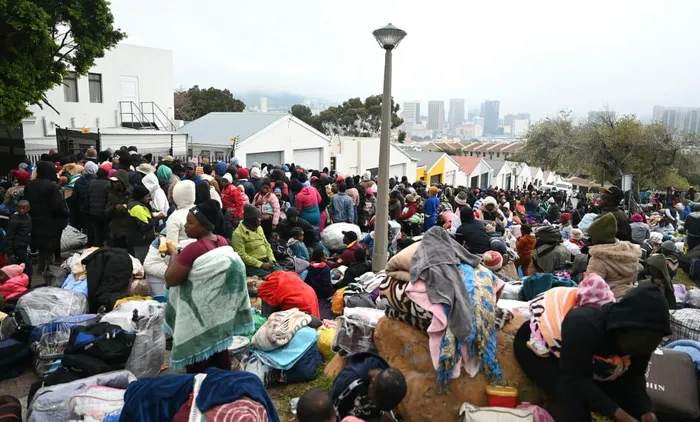 Hundreds of Zimbabwean nationals have gathered outside their country's Consulate in Cape Town