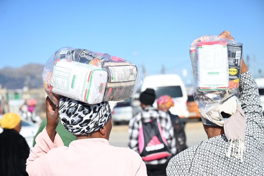 Lwandle families receive vital food aid as they rebuild after devastating floods