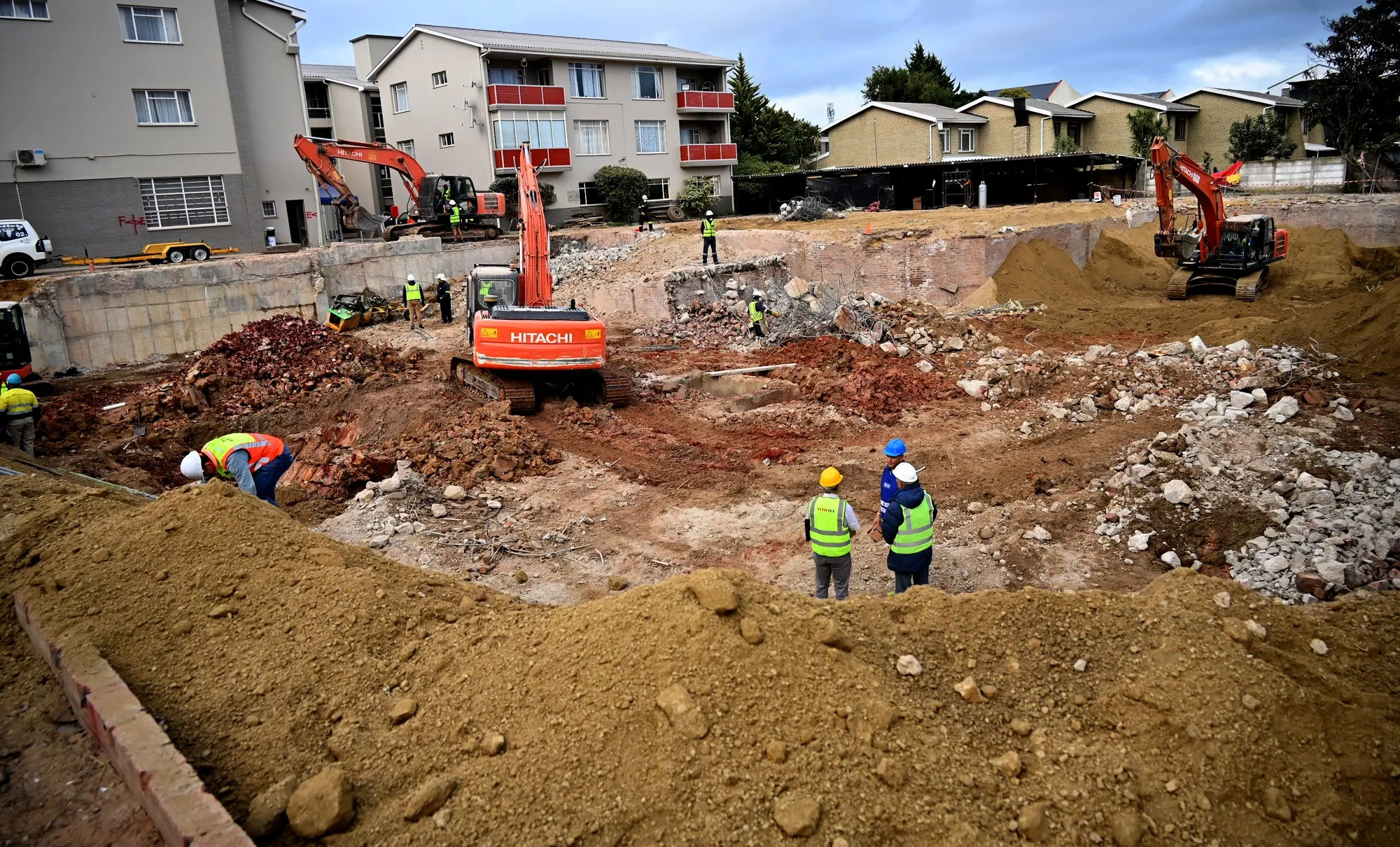 Hand found by security guard at the collapsed building site in George - Vimarsana News