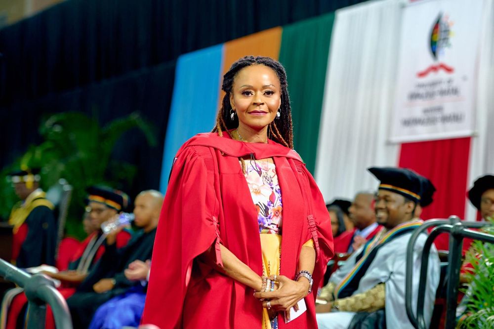 Graduation architect Dr Normah Zondo dons the red gown at UKZN graduation