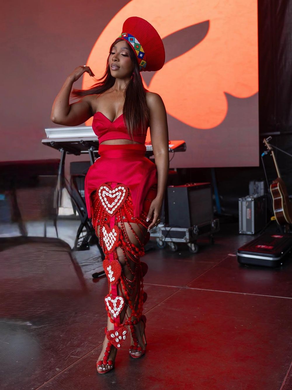 Pearl Modiadie turns heads in crimson Gert-Johan Coetzee look at Scatterlings Music Festival
