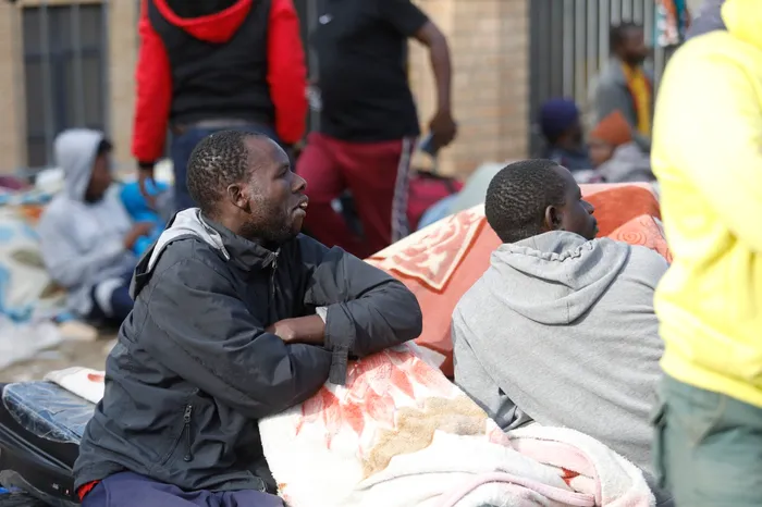 Scores of Malawian migrants taking refugee at a Sherwood sports ground in Durban whilst waiting to be processed before they can board buses to their hometowns in Malawi.
