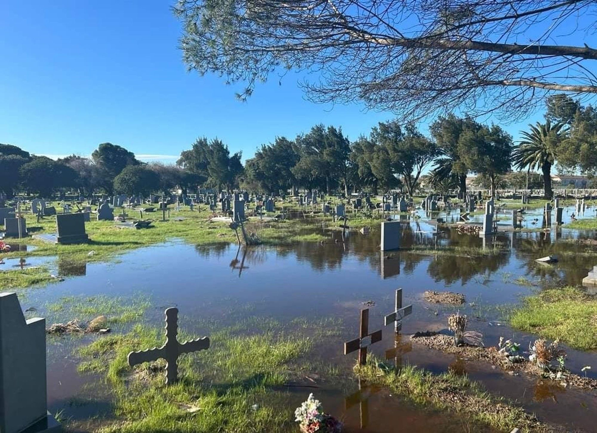 Graveyards hit by flooding but burials continue