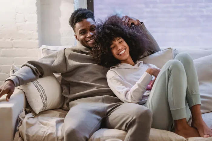 Young couple purchasing property supported by property market budget