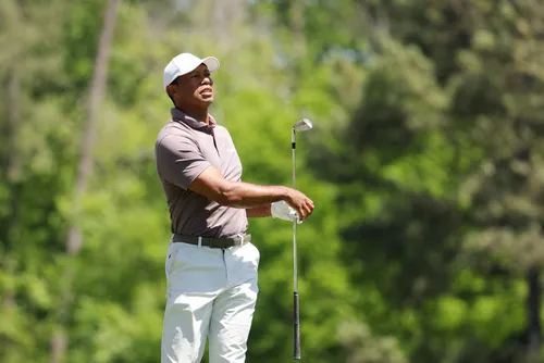 Tiger Woods grinds to Masters record as strong winds cause havoc