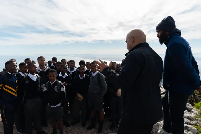  Eddie Andrews at the lower cable car station meeting the learners from Mokone Primary School in Langa.