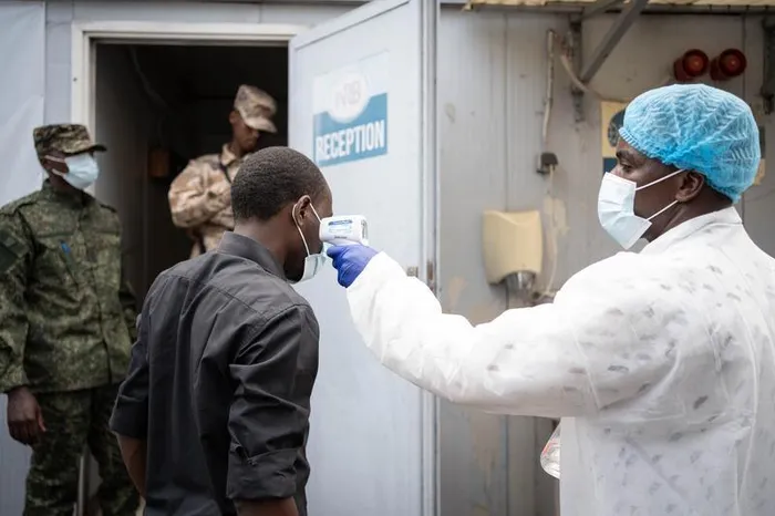 A medical worker checks the temperature of a local resident as part of Ebola screening in Goma, the Democratic Republic of the Congo. Around 131 suspected deaths and 513 suspected cases have been reported in the latest Ebola outbreak in the Democratic Republic of the Congo, DRC Health Minister Roger Kamba
