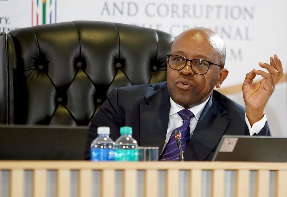 Madlanga calls for tougher action to make corruption ‘hazardous’