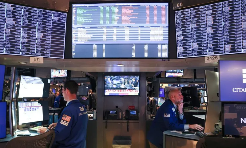 Wall Street closes higher, but futures waver ahead of earnings reports