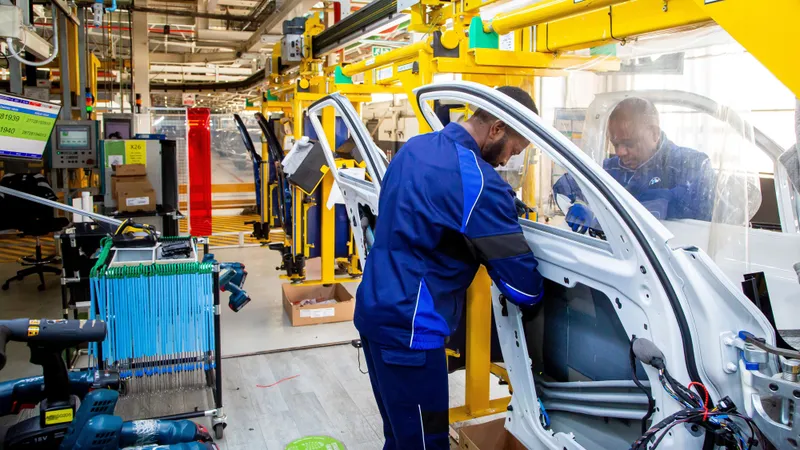 Manufacturing sector rebounds as PMI hits near 4-year high despite cost pressures