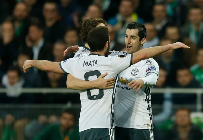 Henrikh Mkhitaryan enjoys the moment with his Manchester United teammates after scoring the only goal. Photo: Andrew Boyers, Action Images via Reuters