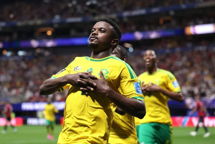 Bafana Bafana midfielder Teboho Mokoena celebrates after a scoring a penalty against the Czech Republic.