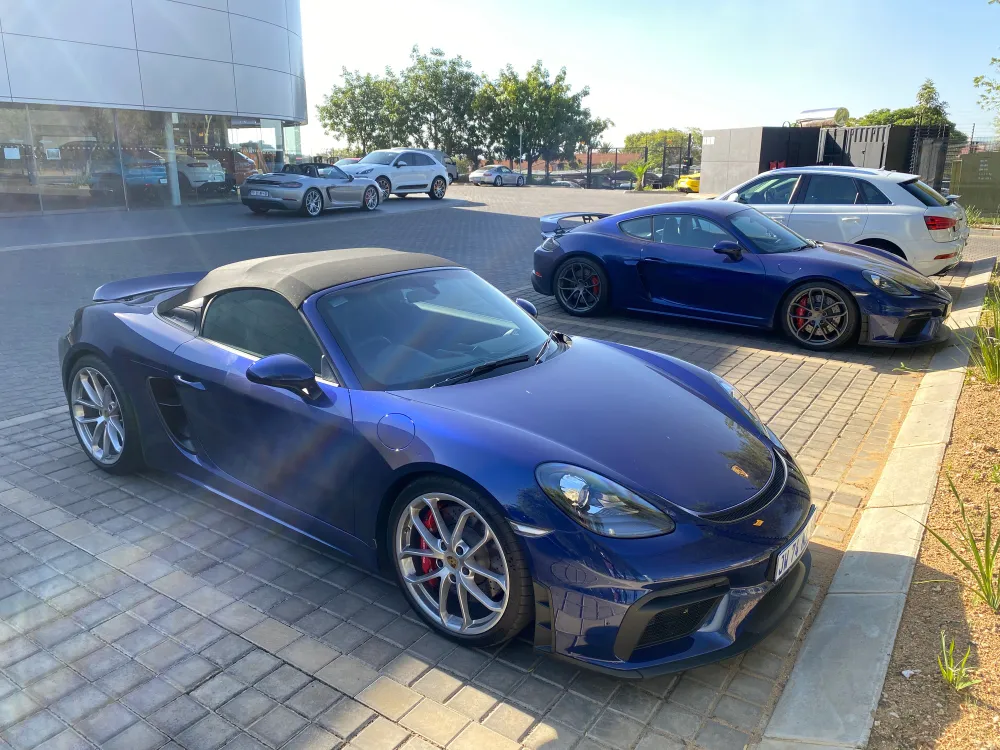 2021 Porsche 718 Spyder and 2021 Porsche 718 GT4 in Gentian Blue