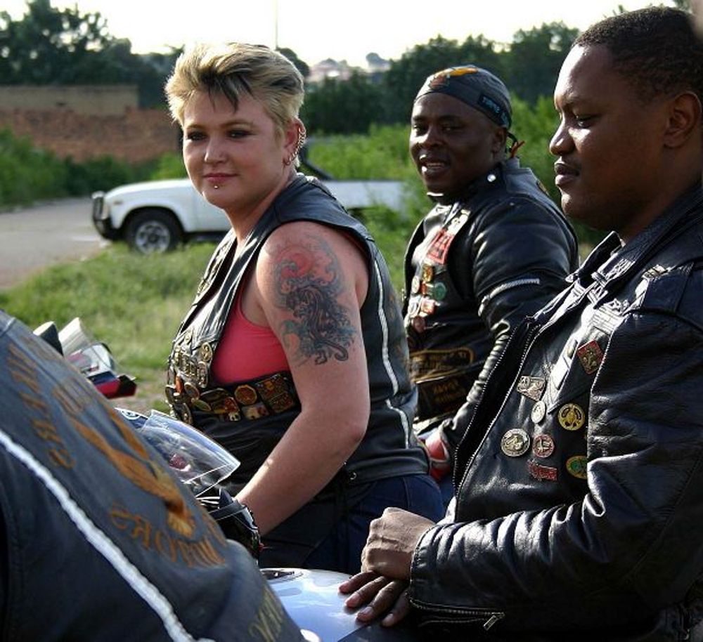 Blonde biker Corrie flies with black Eagles