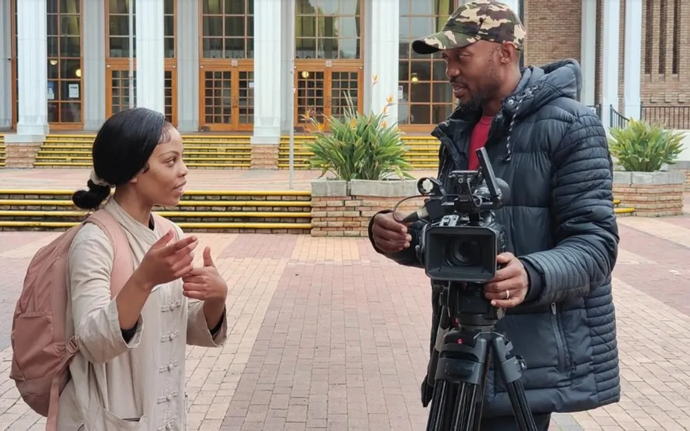 Sinovuyo Khanyisile Mkula, a student of traditional Chinese medicine at the University of the Western Cape who won the First Prize in the ‘My Dream’ Painting Competition for African Youth with her artwork ‘Harmony,’ takes an interview in Cape Town, South Africa, on June 14, 2023. Confucius Institute at University of Western Cape. Pic: Xinhua