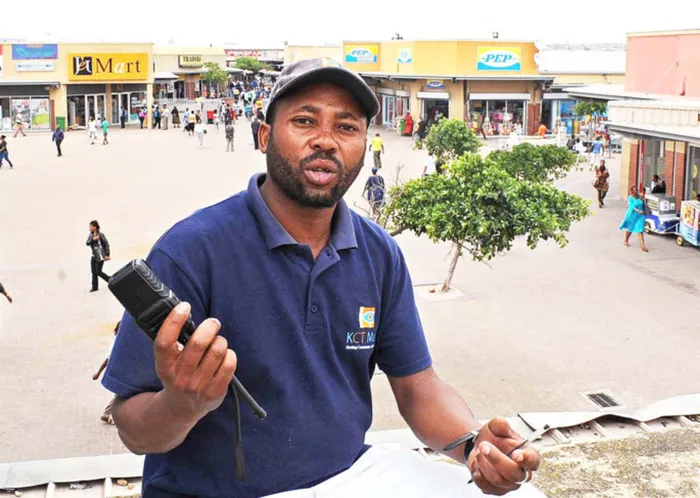 Nkosinathi Magubudele tried to help one of two men who collapsed at the Khayelitsha mall. Picture: Tracey Adams