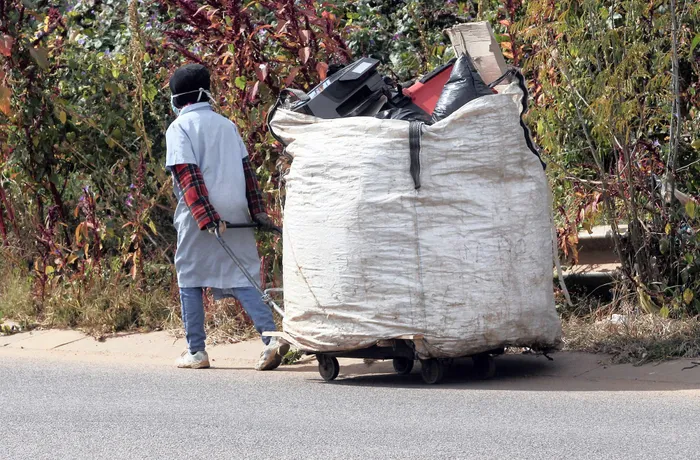 A waste picker with his load. Picture: Jacques Naude African News Agency (ANA)