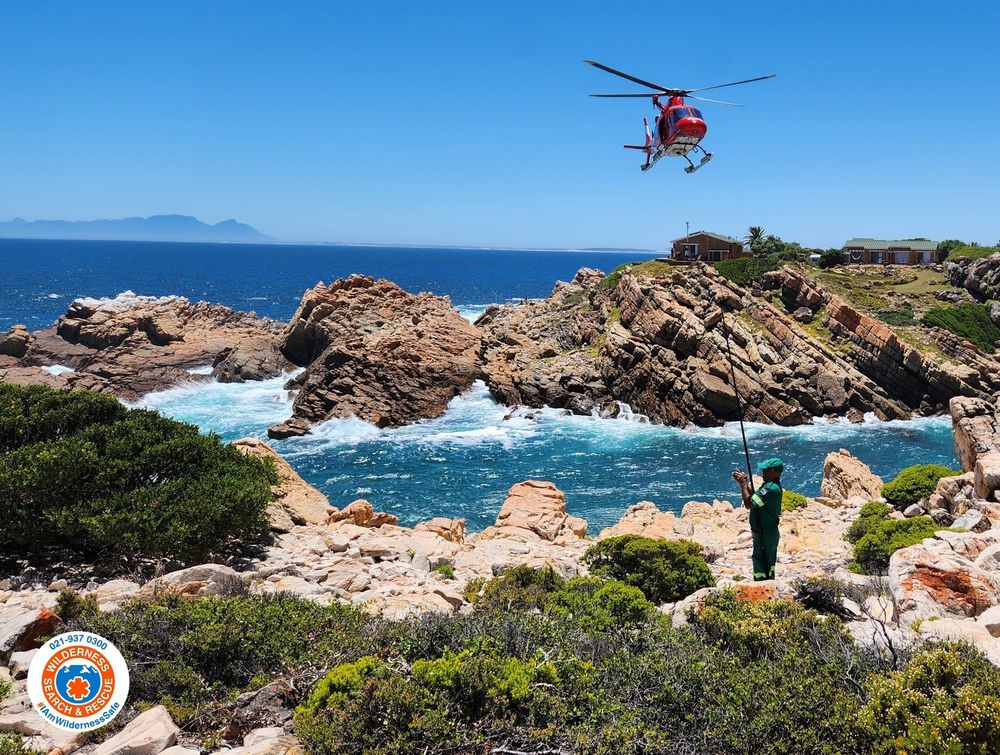 PICS: Reeling in a big catch sees fisherman rescued on the rocks by a ...