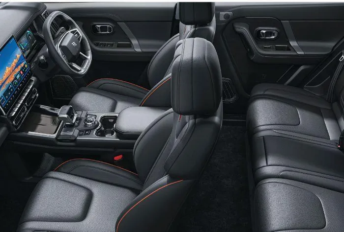 The T1’s cabin mirrors the T2’s tech-heavy layout, but with a more restrained visual approach.
