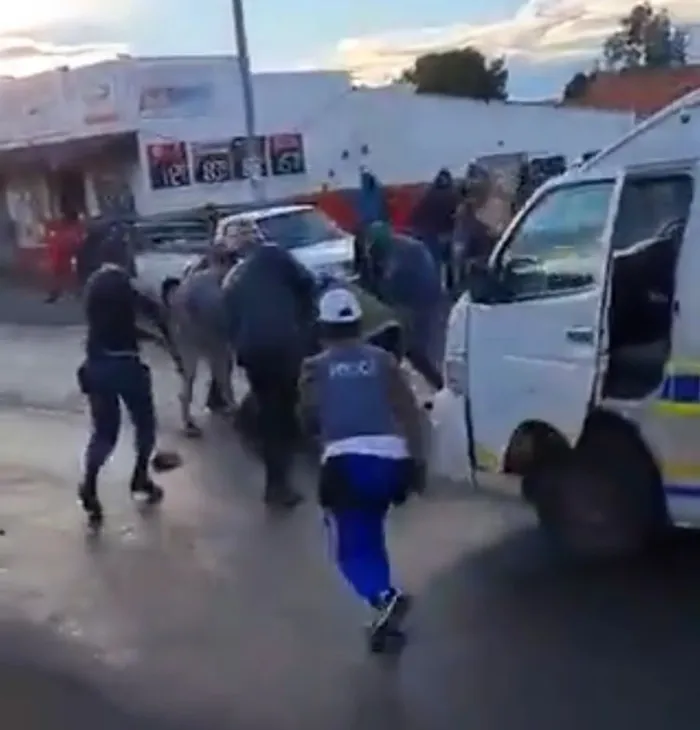 A murder suspect squared up to police in Aliwal North, just moments after he allegedly stabbed a 55-year-old man to death. Picture: Screenshot