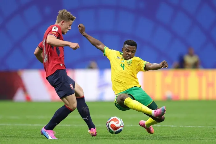Lukas Cerv of Czechia is tackled by Teboho Mokoena of South Africa during the FIFA World Cup 2026 Group A match at Atlanta Stadium on Thursday night.