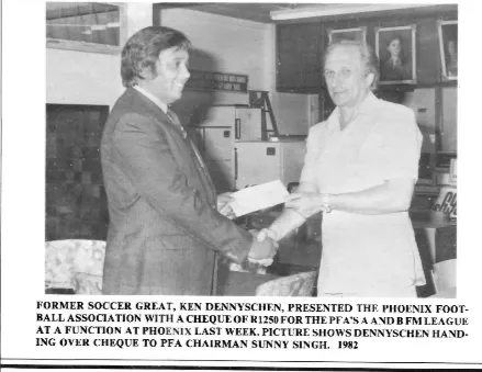 Former soccer great, Ken Dennyschen, right, presented Sunny Singh, the PFA chairperson, a cheque of R1,250. 