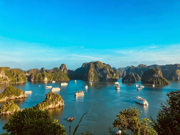 Enjoy boat tours and kayaking at Ha Long Bay in Vietnam. 