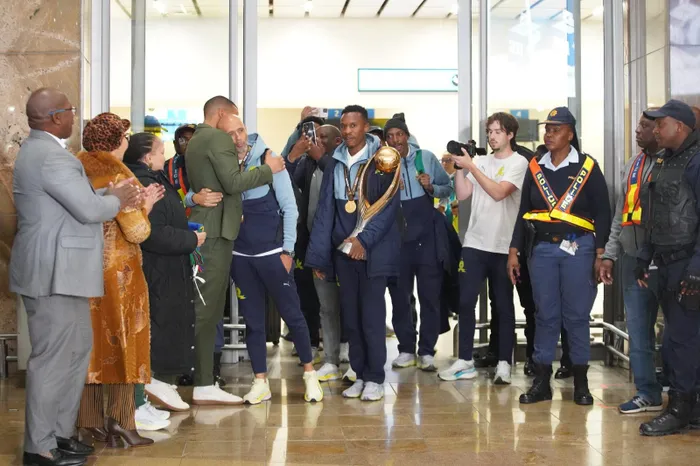 Mamelodi Sundowns arrived at OR Tambo International Airport late on Monday night to rapturous celebrations, after winning their second CAF Champions League title. Photo: Oupa Mokoena Independent Media
