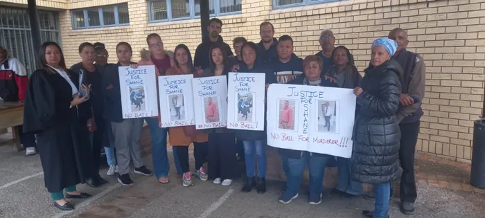 Murder victim Shane Human’s family outside Blue Down Magistrate’s Court to oppose bail being granted to Gareth Blight. l MANDILAKHE TSHWETE