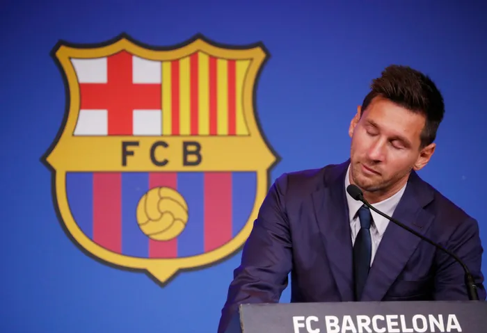Lionel Messi speaks during a press conference to confirm his departure from Barcelona