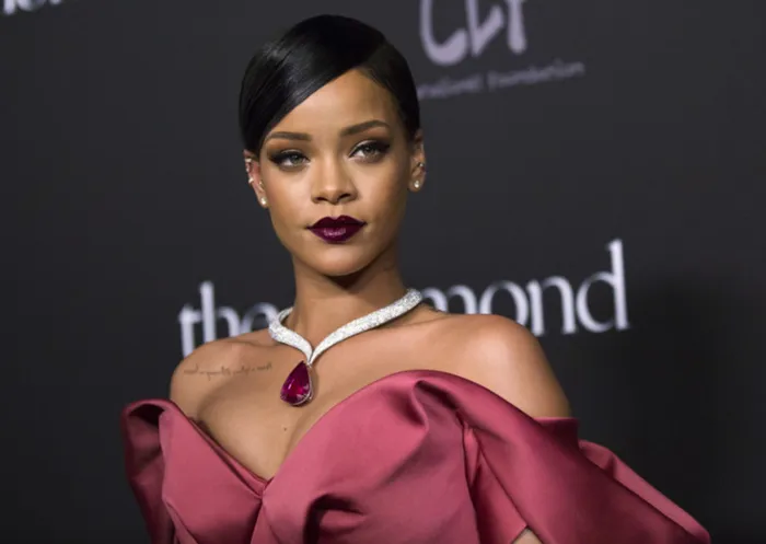 Singer Rihanna poses at the First Annual Diamond Ball fundraising event at The Vineyard in Beverly Hills, California December 11, 2014. The event benefits the Clara Lionel Foundation (CLF). REUTERS/Mario Anzuoni (UNITED STATES - Tags: ENTERTAINMENT) - RTR4HPU7