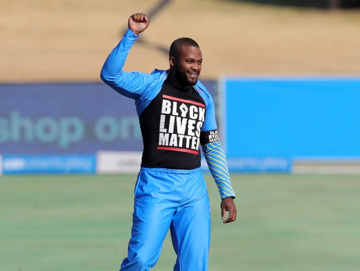 When Andile Phehlukwayo raised his right hand and removed his shirt after taking Heinrich Klaasen’s wicket in the 3TC Solidarity Cup match to showcase a “Black Lives Matter” logo emblazoned on his chest he certainly would not need to apologise to his teammates afterwards in the SuperSport Park dressing room. Photo: Samuel Shivambu/BackpagePix