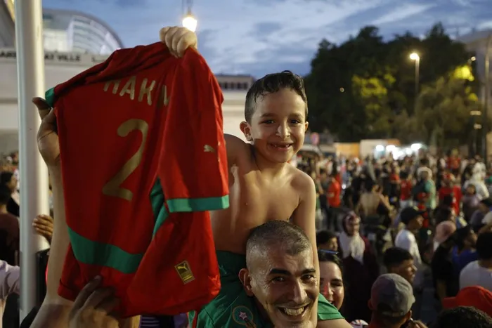 Moroccan football supporters gather along Mohammed V Boulevard in downtown Rabat to celebrate Morocco's historic qualification for the quarter-finals of the 2026 Fifa World Cup following the Atlas Lions' impressive 3–0 victory over Canada on July 4, 2026.