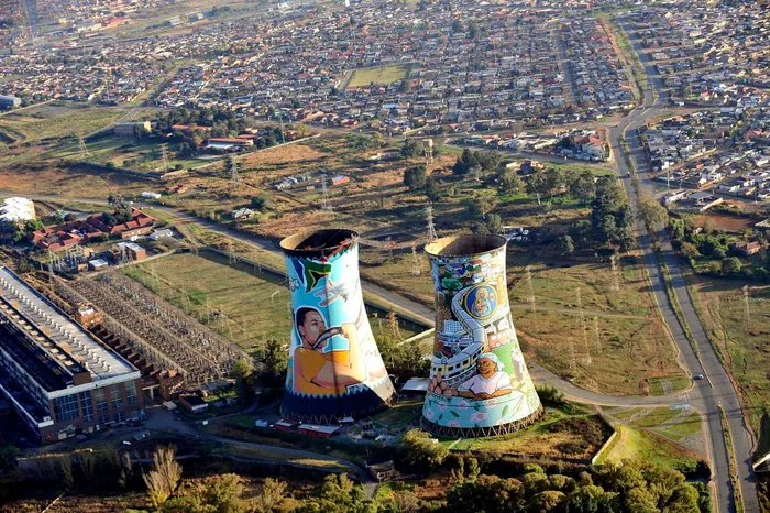 An aerial view of Soweto, including its iconic Orlando towers.