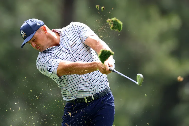 Bryson DeChambeau of the United States plays his shot from the fourth tee during the first round of the 2024 Masters Tournament at Augusta National Golf Club