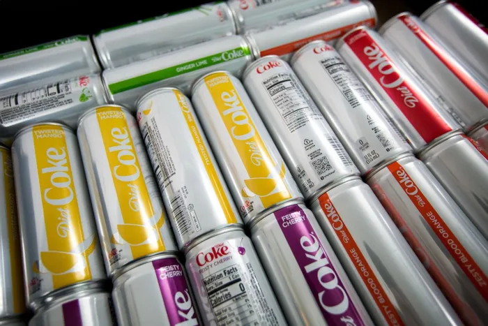 Coca-Cola Co. Diet Coke cans are displayed at the New York Stock Exchange (NYSE) in New York, U.S., on Monday, Jan. 29, 2018. All major U.S. stock indexes declined and Treasuries extended a selloff that's taken yields to the highest since early 2014 as traders gear up for a hectic week of data and policy announcements. Photographer: Michael Nagle/Bloomberg
