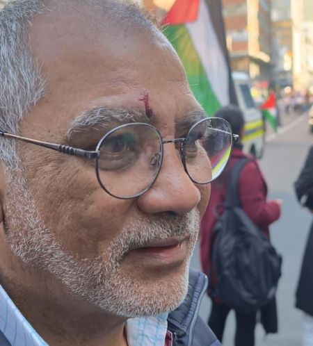 WATCH: Pro-Israeli protester accused of punching veteran journalist during court protest